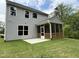 Backyard view features a screened in porch and a patio at 137 Stallion Way, Benson, NC 27504