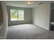 Upstairs bonus room with carpet at 137 Stallion Way, Benson, NC 27504