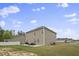 Home's backyard features a patio and grassy area at 148 Cumberland Dr, Sanford, NC 27332