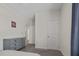 Bedroom with gray dresser and view of additional rooms at 148 Cumberland Dr, Sanford, NC 27332