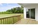New back deck overlooks lawn and wooded area at 155 Scenic Rock Dr, Youngsville, NC 27596