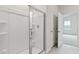 Modern bathroom features a shower with glass door and tile surround at 155 Scenic Rock Dr, Youngsville, NC 27596