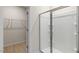 Bathroom with a large walk-in shower and closet at 155 Scenic Rock Dr, Youngsville, NC 27596