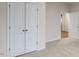 Bright bedroom with double door closet and neutral wall at 155 Scenic Rock Dr, Youngsville, NC 27596