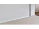Bright bedroom features fresh paint, neutral carpeting, and hallway access at 155 Scenic Rock Dr, Youngsville, NC 27596