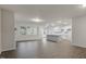 Open concept living room with kitchen and hardwood floor at 155 Scenic Rock Dr, Youngsville, NC 27596