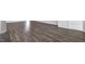 Spacious living room with new hardwood floors and plenty of natural light at 155 Scenic Rock Dr, Youngsville, NC 27596