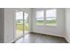 Outdoor patio is accessed via sliding glass door, which fills the room with natural light at 155 Scenic Rock Dr, Youngsville, NC 27596