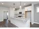 Kitchen with white cabinets, granite countertops and island at 1549 Piney Fls Dr, Wendell, NC 27591