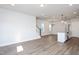 Kitchen with white cabinets, granite countertops, and island at 1549 Piney Fls Dr, Wendell, NC 27591