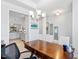 Spacious dining room with view into kitchen and includes a work area at 168 Northwood Dr, Fuquay Varina, NC 27526