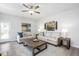 Bright living room featuring a neutral color palette and ample natural light at 168 Northwood Dr, Fuquay Varina, NC 27526