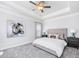 Main bedroom with a large bed, plenty of natural light, and neutral decor at 168 Northwood Dr, Fuquay Varina, NC 27526