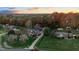 Aerial view of home on a tree-lined street, showcasing the property and neighborhood at 1991 Webster Grove Dr, Mebane, NC 27302