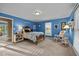 Bright bedroom with wooden bed frame and built in shelving at 1991 Webster Grove Dr, Mebane, NC 27302