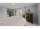 Spacious bedroom with large window and built-in desk area at 1991 Webster Grove Dr, Mebane, NC 27302