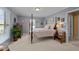 Guest bedroom with a comfortable bed and window seat at 1991 Webster Grove Dr, Mebane, NC 27302