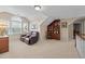 Comfortable bonus room with a recliner and built-in bookcase at 1991 Webster Grove Dr, Mebane, NC 27302