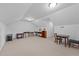 Spacious bonus room with ample natural light and built in shelving at 1991 Webster Grove Dr, Mebane, NC 27302