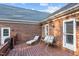 Relaxing deck with comfortable seating and access to the backyard at 1991 Webster Grove Dr, Mebane, NC 27302