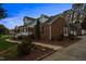Brick house with a driveway and landscaped yard at 1991 Webster Grove Dr, Mebane, NC 27302