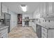 Modern kitchen with stainless steel appliances and granite countertops at 1991 Webster Grove Dr, Mebane, NC 27302