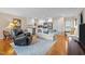 Cozy kitchenette with white cabinets, stainless steel appliances, and hardwood floors at 1991 Webster Grove Dr, Mebane, NC 27302