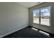 A cozy bedroom features a large window offering natural light and exterior views at 286 Longbow Dr, Middlesex, NC 27557