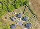 Overhead view of homes on cul-de-sac with spacious yards and tree lined background at 298 Hannah Yam Ln, Benson, NC 27504