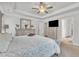 The primary bedroom features neutral tones, a ceiling fan, and coordinated furnishings at 298 Hannah Yam Ln, Benson, NC 27504