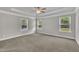 The room features plush carpet, neutral paint, and a modern ceiling fan at 298 Hannah Yam Ln, Benson, NC 27504