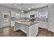 Modern kitchen with granite countertops, stainless steel appliances, and white cabinets at 298 Hannah Yam Ln, Benson, NC 27504