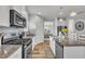 Gourmet kitchen with granite counters, stainless appliances, and an island with seating at 298 Hannah Yam Ln, Benson, NC 27504