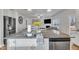 Modern kitchen island features granite countertops, stainless steel appliances, and ample storage at 298 Hannah Yam Ln, Benson, NC 27504