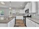 Bright, open kitchen features granite counters, stainless appliances, and ample cabinet space at 298 Hannah Yam Ln, Benson, NC 27504