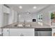 Kitchen island features granite countertops and stainless steel appliances at 298 Hannah Yam Ln, Benson, NC 27504
