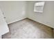 Simple bedroom with neutral carpeting and window at 311 Gladstone Dr, Durham, NC 27703