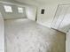 Large living room with neutral carpet and closet at 311 Gladstone Dr, Durham, NC 27703