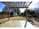 Backyard with pergola, shed and fenced in area at 36 Aster Ln, Pittsboro, NC 27312