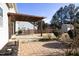 Relaxing backyard patio with pergola and brick pavers at 36 Aster Ln, Pittsboro, NC 27312