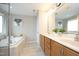 Double vanity bathroom with soaking tub and shower at 36 Aster Ln, Pittsboro, NC 27312