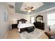 Main bedroom with ceiling fan and large windows at 36 Aster Ln, Pittsboro, NC 27312