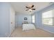 Light blue bedroom with a full bed and ceiling fan at 36 Aster Ln, Pittsboro, NC 27312