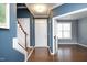 Bright and airy entryway with hardwood floors and staircase at 36 Aster Ln, Pittsboro, NC 27312