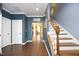 Hardwood floors, white doors, and a view to the living area at 36 Aster Ln, Pittsboro, NC 27312