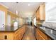 Open concept kitchen with island overlooking living room at 36 Aster Ln, Pittsboro, NC 27312