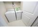 Laundry room with washer, dryer, and storage at 36 Aster Ln, Pittsboro, NC 27312