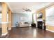 Living room with a fireplace, hardwood floors and a ceiling fan at 36 Aster Ln, Pittsboro, NC 27312