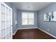 Home office with hardwood floors and a window with blinds at 36 Aster Ln, Pittsboro, NC 27312