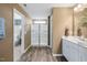 Well-lit bathroom featuring a glass shower, stylish vanity, and neutral tones creating a calming atmosphere at 103 Siebold St, Garner, NC 27529